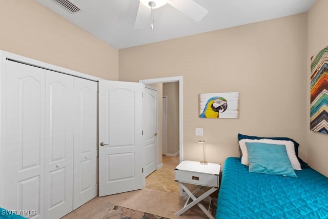 16148 Bonita Landing Cir, Bonita Springs, FL 34135 - bedroom featuring light colored carpet, a closet, ceiling fan, and visible vents