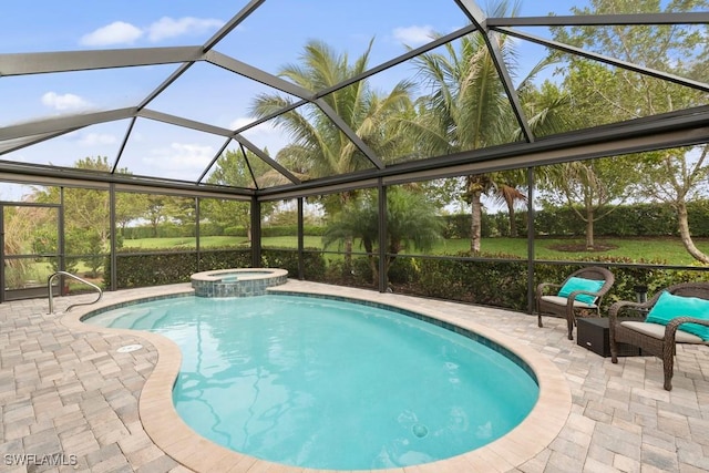 16148 Bonita Landing Cir, Bonita Springs, FL 34135 - view of pool with a patio, a pool with connected hot tub, and glass enclosure