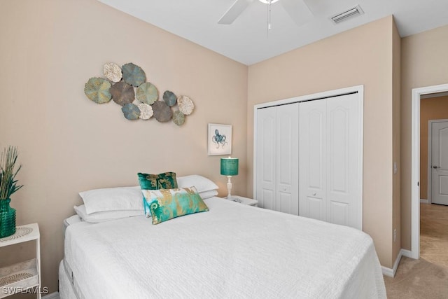 16148 Bonita Landing Cir, Bonita Springs, FL 34135 - bedroom featuring a closet, baseboards, visible vents, ceiling fan, and light colored carpet