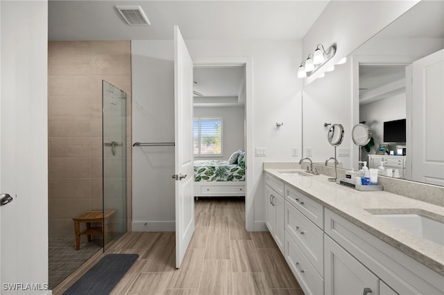44372 Panther Dr, Punta Gorda, FL 33982 - ensuite bathroom featuring a stall shower, ensuite bathroom, a sink, and visible vents