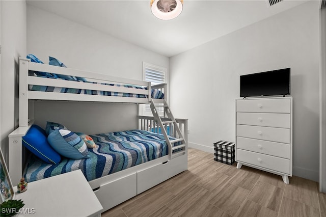 44372 Panther Dr, Punta Gorda, FL 33982 - bedroom featuring wood finished floors and baseboards