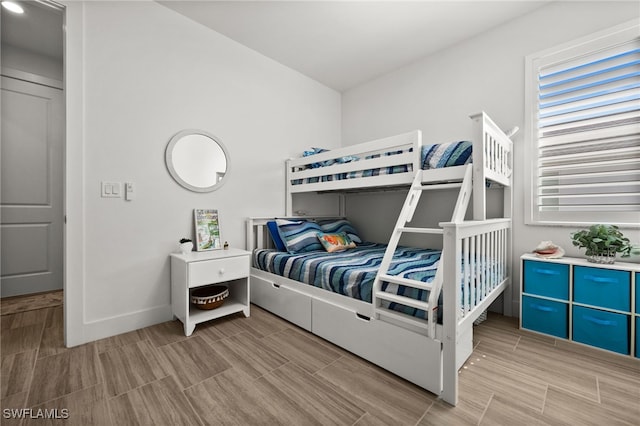 44372 Panther Dr, Punta Gorda, FL 33982 - bedroom with baseboards and wood finish floors