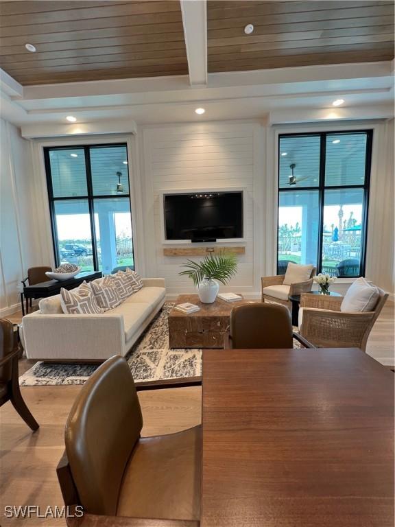 44372 Panther Dr, Punta Gorda, FL 33982 - living area featuring beam ceiling and wood finished floors