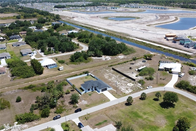 435 Pickford Ave, Lehigh Acres, FL 33974 - aerial view of residential area featuring a nearby body of water