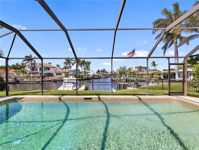 pool featuring a water view and a lanai