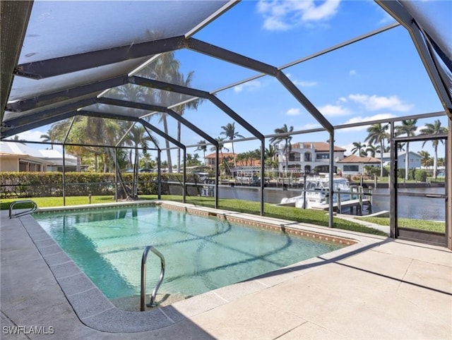 pool featuring a lanai, a patio, a dock, and a water view