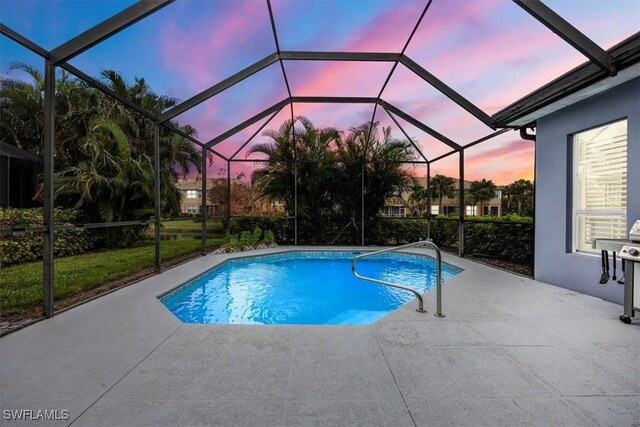 pool featuring a patio area and a lanai
