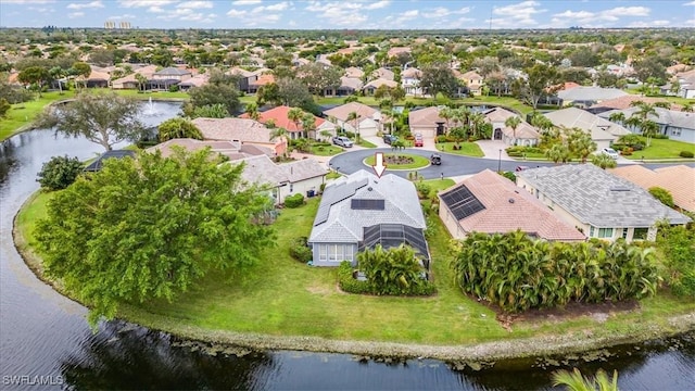 aerial view with a water view and a residential view