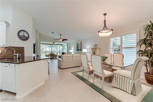 9241 Spring Run Blvd Unit 2202, Estero, FL 34135 - dining area with light tile patterned floors, a wealth of natural light, a ceiling fan, and lofted ceiling