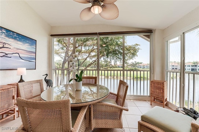 9241 Spring Run Blvd Unit 2202, Estero, FL 34135 - sunroom with a water view, tile patterned flooring, and vaulted ceiling