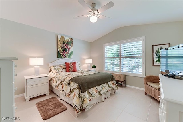 9241 Spring Run Blvd Unit 2202, Estero, FL 34135 - bedroom with ceiling fan, baseboards, lofted ceiling, and light tile patterned floors