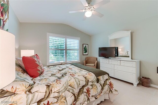 9241 Spring Run Blvd Unit 2202, Estero, FL 34135 - bedroom featuring light tile patterned floors, ceiling fan, and vaulted ceiling