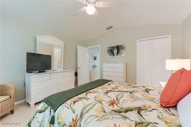 9241 Spring Run Blvd Unit 2202, Estero, FL 34135 - bedroom featuring visible vents, a closet, light tile patterned floors, a ceiling fan, and vaulted ceiling