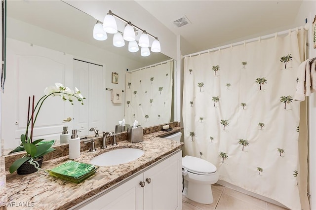 9241 Spring Run Blvd Unit 2202, Estero, FL 34135 - full bathroom with visible vents, a shower with curtain, toilet, vanity, and tile patterned flooring