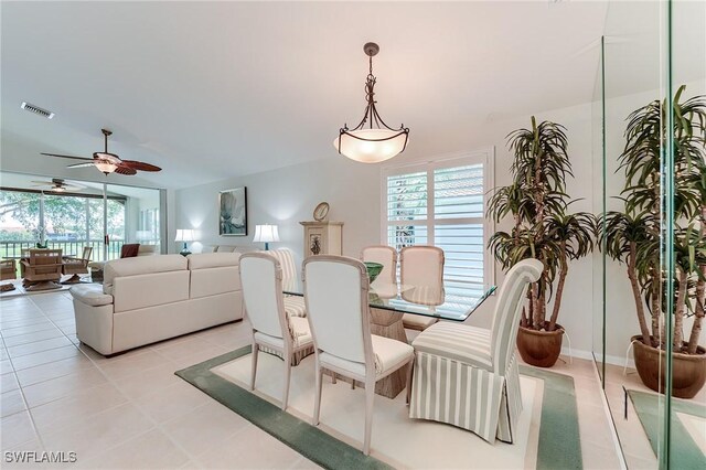 9241 Spring Run Blvd Unit 2202, Estero, FL 34135 - dining room featuring plenty of natural light, light tile patterned floors, visible vents, and a ceiling fan