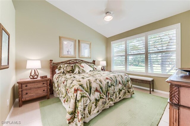 9241 Spring Run Blvd Unit 2202, Estero, FL 34135 - tiled bedroom with ceiling fan, baseboards, and lofted ceiling
