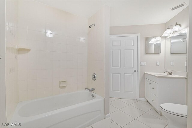 3831 Pelican Blvd, Cape Coral, FL 33914 - full bathroom with visible vents, toilet, shower / tub combination, vanity, and tile patterned floors