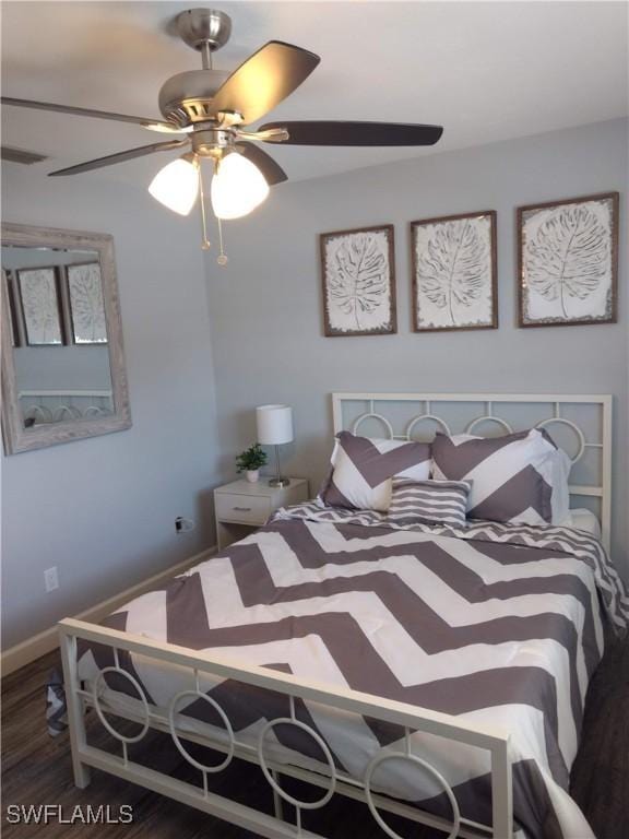 787 106th Ave N, Naples, FL 34108 - bedroom featuring wood finished floors, baseboards, and a ceiling fan