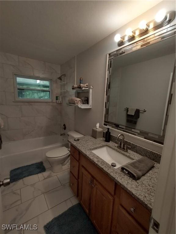 787 106th Ave N, Naples, FL 34108 - bathroom with toilet, tub / shower combination, vanity, and marble finish floors