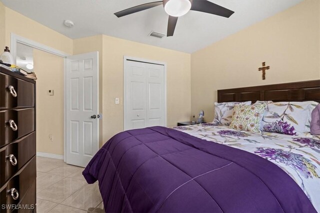 605 SE 22nd St, Cape Coral, FL 33990 - bedroom with baseboards, a closet, light tile patterned floors, a ceiling fan, and visible vents