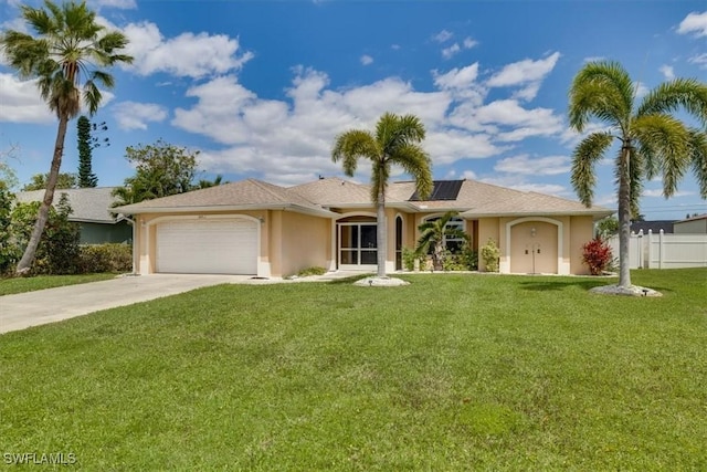 605 SE 22nd St, Cape Coral, FL 33990 - single story home featuring stucco siding, a front yard, fence, a garage, and driveway