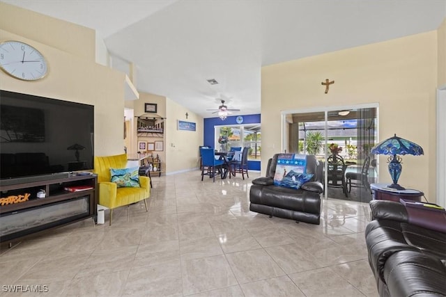 605 SE 22nd St, Cape Coral, FL 33990 - living room featuring visible vents, a ceiling fan, and vaulted ceiling
