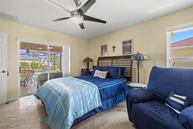 605 SE 22nd St, Cape Coral, FL 33990 - bedroom featuring tile patterned floors, access to outside, visible vents, and ceiling fan