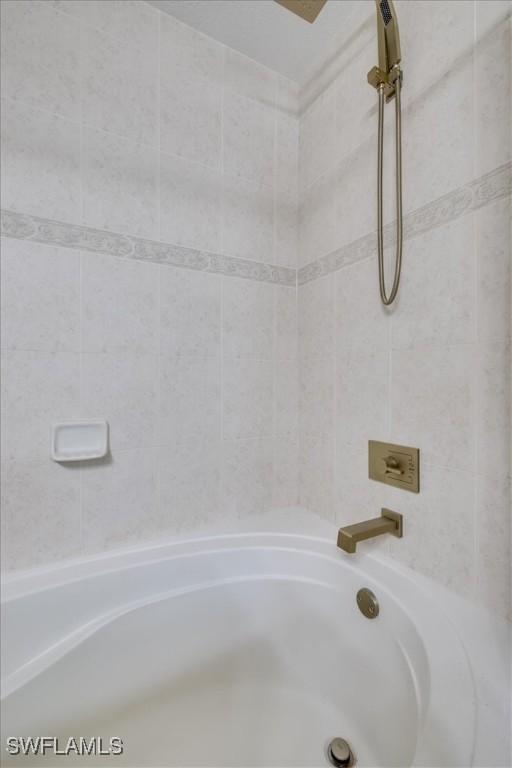 605 SE 22nd St, Cape Coral, FL 33990 - bathroom with tub / shower combination
