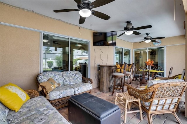 605 SE 22nd St, Cape Coral, FL 33990 - sunroom / solarium featuring outdoor lounge area and a ceiling fan