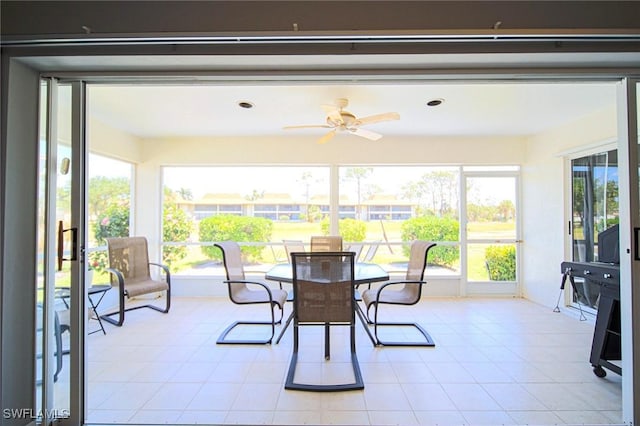 25431 Fairway Dunes Ct, Bonita Springs, FL 34135 - sunroom featuring tile patterned floors