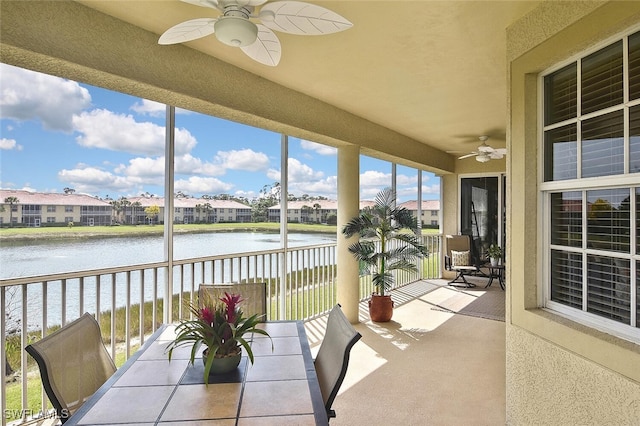 5600 Chelsey Ln Unit 201, Fort Myers, FL 33912 - sunroom / solarium featuring a residential view, a ceiling fan, and a water view