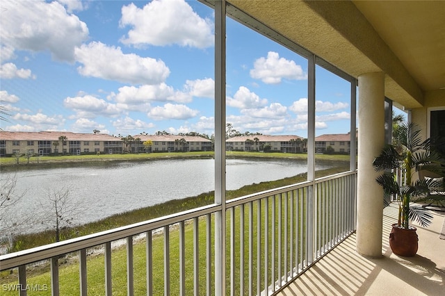 5600 Chelsey Ln Unit 201, Fort Myers, FL 33912 - sunroom / solarium featuring a water view and a residential view