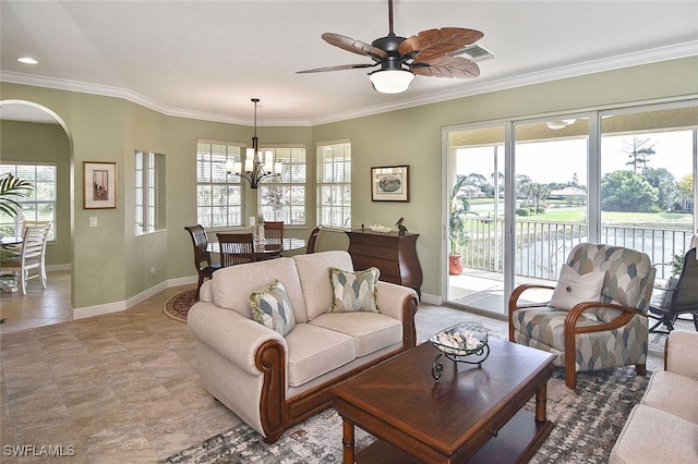 5600 Chelsey Ln Unit 201, Fort Myers, FL 33912 - living area featuring baseboards, arched walkways, and plenty of natural light