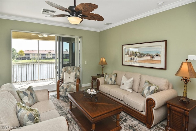5600 Chelsey Ln Unit 201, Fort Myers, FL 33912 - living room featuring baseboards, ornamental molding, a ceiling fan, visible vents, and a water view