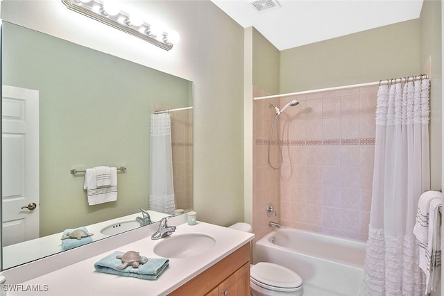 5600 Chelsey Ln Unit 201, Fort Myers, FL 33912 - bathroom featuring toilet, shower / tub combo, vanity, and visible vents