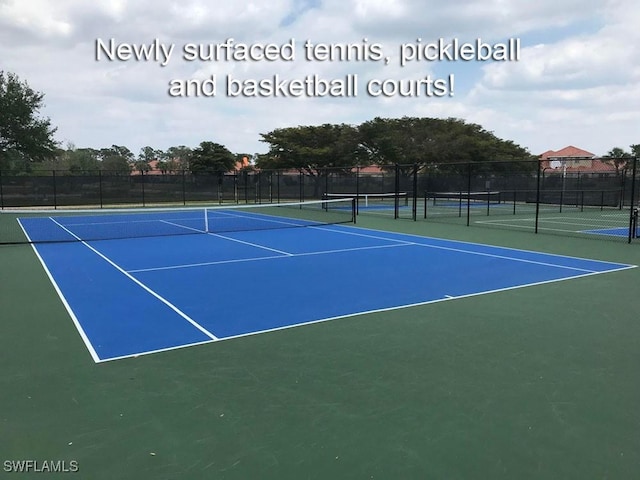 5600 Chelsey Ln Unit 201, Fort Myers, FL 33912 - view of sport court with community basketball court and fence