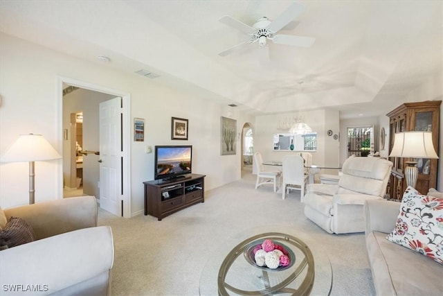 721 Mardel Dr Unit 602, Naples, FL 34104 - living area with arched walkways, visible vents, light colored carpet, and a ceiling fan