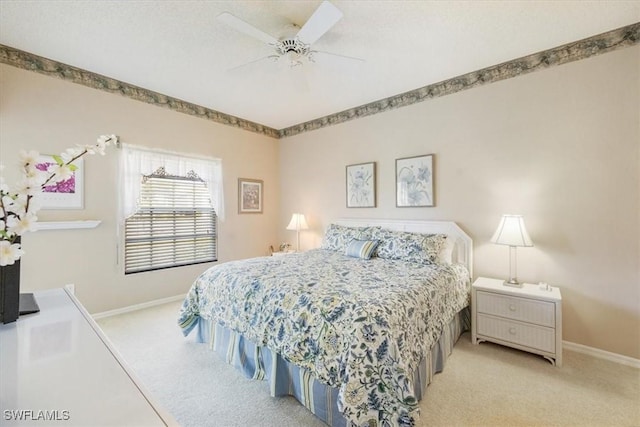 721 Mardel Dr Unit 602, Naples, FL 34104 - bedroom with light colored carpet, baseboards, and a ceiling fan
