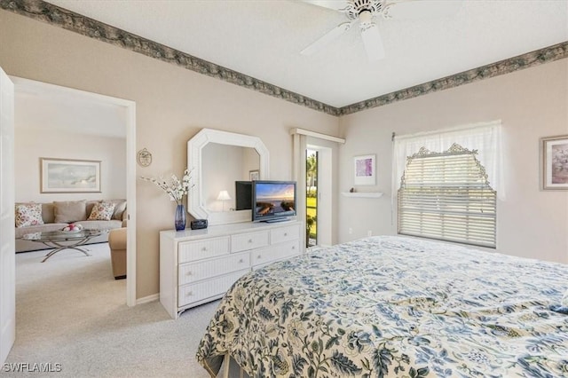 721 Mardel Dr Unit 602, Naples, FL 34104 - bedroom featuring light colored carpet, ceiling fan, and baseboards