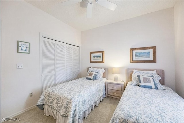 721 Mardel Dr Unit 602, Naples, FL 34104 - bedroom with a closet, light colored carpet, baseboards, and a ceiling fan