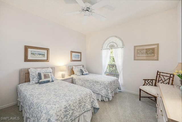 721 Mardel Dr Unit 602, Naples, FL 34104 - bedroom featuring light colored carpet, baseboards, and a ceiling fan