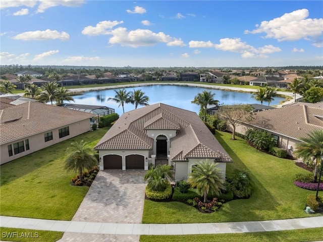 4455 Caldera Cir, Naples, FL 34119 - bird's eye view with a residential view and a water view
