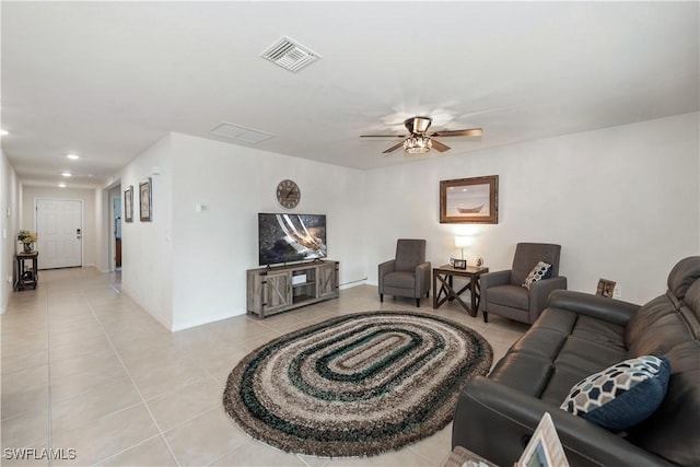 living room with visible vents, light tile patterned floors, baseboards, a ceiling fan, and recessed lighting