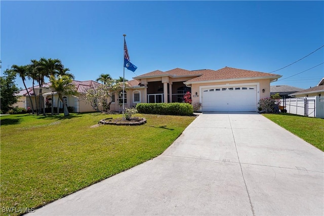 single story home featuring a garage, a front yard, concrete driveway, and fence