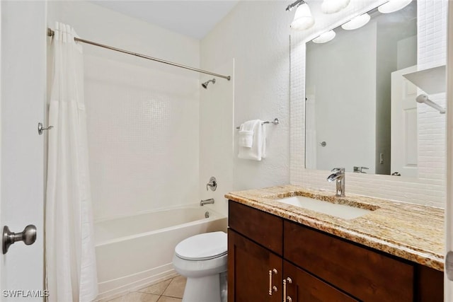 3570 Haldeman Creek Dr Unit 134, Naples, FL 34112 - bathroom featuring tile patterned floors, shower / bathtub combination with curtain, vanity, and toilet