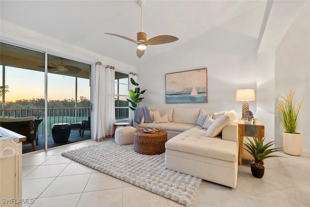 3570 Haldeman Creek Dr Unit 134, Naples, FL 34112 - living area featuring ceiling fan, tile patterned flooring, and lofted ceiling