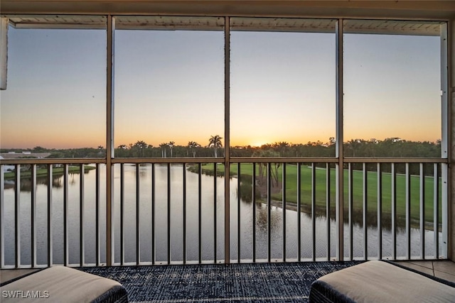 3570 Haldeman Creek Dr Unit 134, Naples, FL 34112 - sunroom with a water view