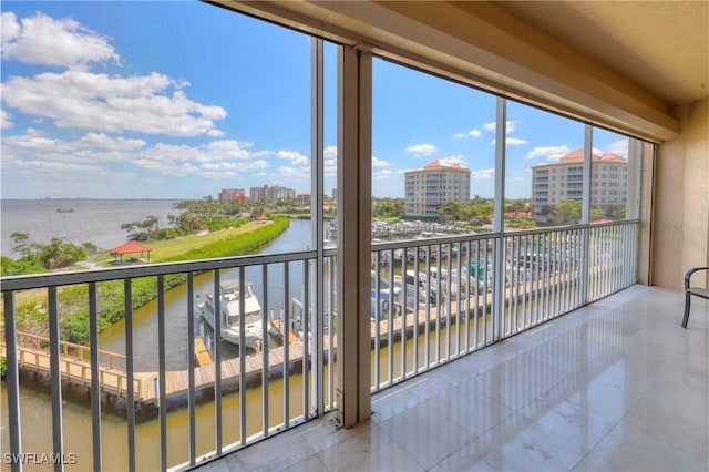 15220 Portside Dr Unit 301, Fort Myers, FL 33908 - balcony with a water view and a view of city