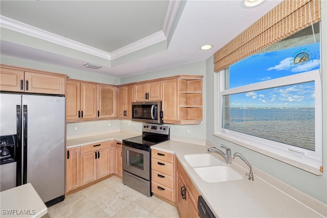 15220 Portside Dr Unit 301, Fort Myers, FL 33908 - kitchen featuring visible vents, light brown cabinetry, stainless steel appliances, and a sink
