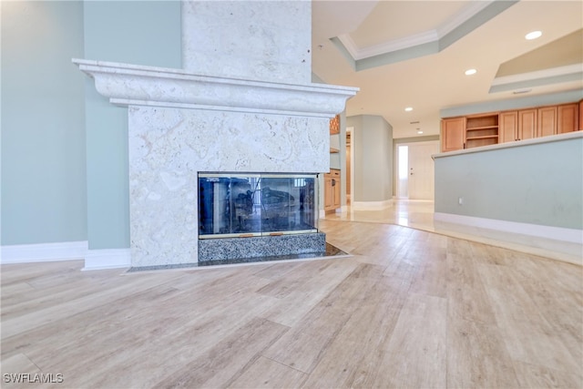 15220 Portside Dr Unit 301, Fort Myers, FL 33908 - interior details featuring wood finished floors, a high end fireplace, baseboards, ornamental molding, and recessed lighting